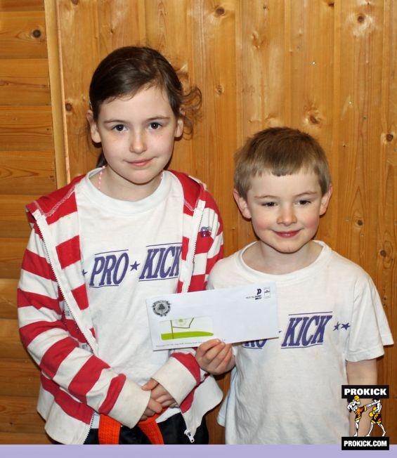 Brother and sister win a prize for the family