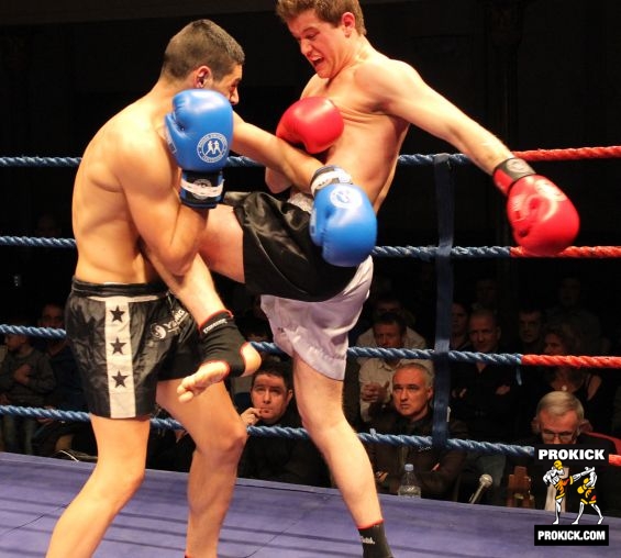 Alex Cioici knee-kicks Spiteri at KICKmas