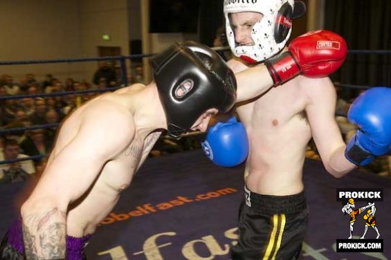 Pope and Cox in kickboxing action 