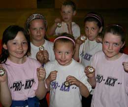 Prokick juniors winning medals - (L-R front) Chelsea Leigh Swift, Saskia Connolly, Laura Macartney, (L-R back) Hayley Paton, Leith Braiden and Sophie Higginson.