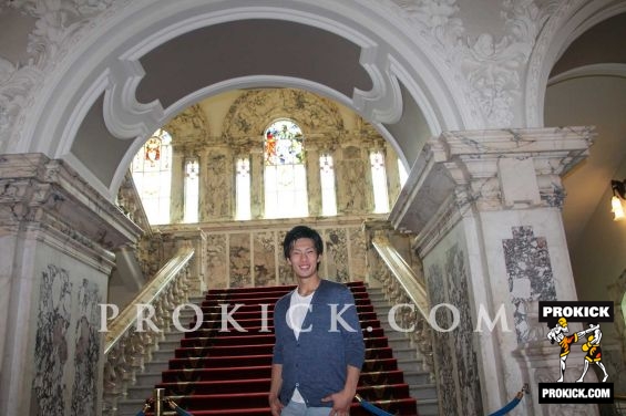 Japanese fighter stands inside City hall