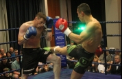 Adrian Tomescu lands round kick