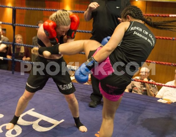 Cathy blocks round-kick from Erdas