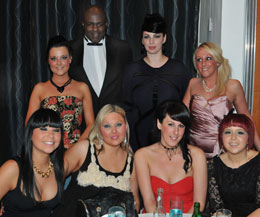 Last years awards night - Pictured Superstar Mr 'Perfect' Ernesto Hoost with some of the girls from the event sponsor - Adele Robinson and Company Haircutters
