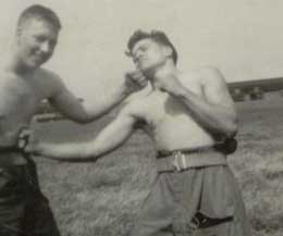 Billy Murray Snr (right) whilst in the army, shows some of his moves that helped inspire his sons Billy and John to take up the sport of kickboxing and boxing