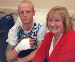 ProKick fighter Darren McMullan's in hospital (Pictured last night) helped looked after by his Mummy - his next fight is now off.
