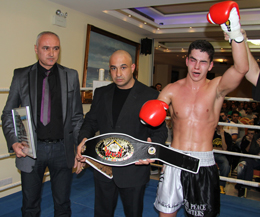 Mr Wkn Stephan cabeara and top promoter in Cyprun present the belts to Karl McBlain