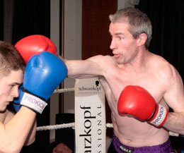 Ken Horan limbers up against Jack Davis from Marty Cox Gym in London