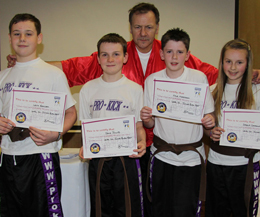 ProKick senior youth members Saskia Connolly, Leith Braiden, Jamie Phillips and Kyle Morrison all passed their Junior Black Belt exam.