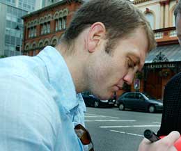 Neil Sinclair signing autographs outside the Ulster Hall when the Venue was the Mecca for Irish Boxing