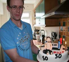 A quiet moment as billy's son William who helps celebrates the BIG 50 at a quite family gathering organised by William