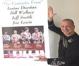 Carl Emery, CEO of Pantheon Sports with the poster containing the original photograph containing the four champions